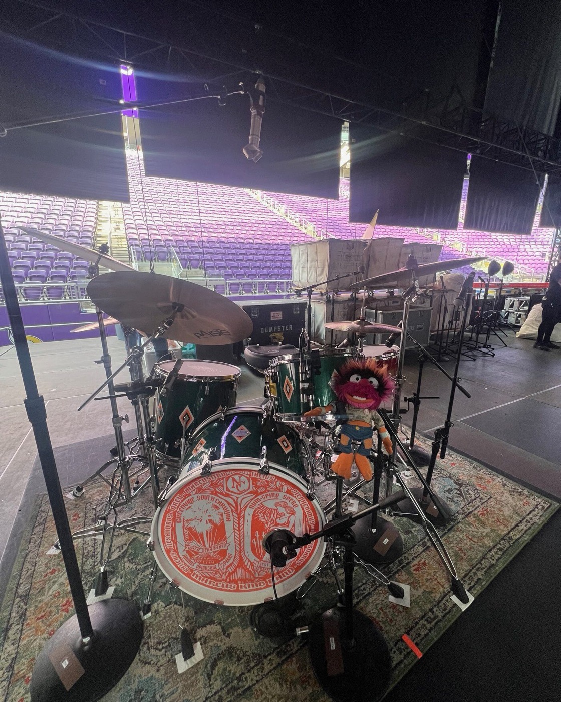 The Marcus King tour kit on stage at US Bank Stadium, 1954 Cadillac Green with crushed glass and diamond inlay